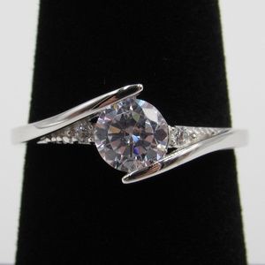 Sterling Silver Between Clear CZ Diamond Band Ring